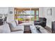 Comfortable living space with a seamless transition to the screened porch and water views beyond at 1014 Calico Gln, Bradenton, FL 34212