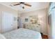 Bright bedroom featuring light walls, natural light, and hardwood floors at 10315 Cortez W Rd # 1G, Bradenton, FL 34210