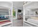 Bedroom with nautical-themed decor and built-in bunk beds at 110 10Th S St, Bradenton Beach, FL 34217