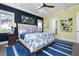 Bedroom features an art niche, tray ceilings, hardwood floors and access to a private balcony at 110 10Th S St, Bradenton Beach, FL 34217