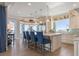 Bright kitchen with island and seating for four, luxury appliances, breakfast nook, and water views at 110 10Th S St, Bradenton Beach, FL 34217