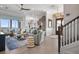 Cozy living room with water views and staircase at 110 10Th S St, Bradenton Beach, FL 34217