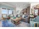 Comfortable living area featuring a plush sofa, patterned rug, and elegant decor, ideal for relaxation at 110 10Th S St, Bradenton Beach, FL 34217