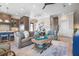 Open-concept living room with a seamless flow to the kitchen and staircase, perfect for modern living at 110 10Th S St, Bradenton Beach, FL 34217