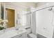 Bathroom showcasing a vanity, tile surround shower and tub with curtain at 13320 Coluccio St, Venice, FL 34293