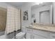 Bright bathroom with a shower and bathtub combination and granite countertops at 14061 Heritage Landing Blvd # 412, Punta Gorda, FL 33955