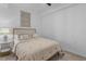 Bedroom with a queen-sized bed with an ensuite bathroom at 14061 Heritage Landing Blvd # 412, Punta Gorda, FL 33955