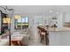 Bright, open-concept living space with golf course views and elegant modern furnishings at 14061 Heritage Landing Blvd # 412, Punta Gorda, FL 33955