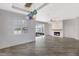 Bright living room with wood-look floors, lots of natural light and decorative lighting at 1407 60Th E St, Bradenton, FL 34208