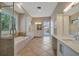 Spacious bathroom showcasing a soaking tub and double vanity at 1511 N Lake Shore Dr, Sarasota, FL 34231