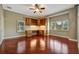 Spacious bedroom with hardwood floors and built-in cabinets at 1511 N Lake Shore Dr, Sarasota, FL 34231