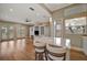 Open-concept living room featuring island seating and built-in shelving at 1511 N Lake Shore Dr, Sarasota, FL 34231