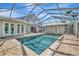 Inviting pool with ample lounge space and seamless flow to the home's living area at 1511 N Lake Shore Dr, Sarasota, FL 34231