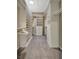 Organized walk-in closet with custom shelving and drawers for ample storage, enhancing convenience at 1511 N Lake Shore Dr, Sarasota, FL 34231