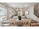 Elegant dining room showcasing coffered ceilings and a spacious layout that opens to the living room at 1876 Livingstone St, Sarasota, FL 34231