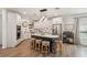 Spacious kitchen with white cabinets, stainless steel appliances, and a center island with seating at 1876 Livingstone St, Sarasota, FL 34231