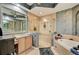 Elegant bathroom with a glass-enclosed shower, soaking tub, and dual sinks offering a spa-like experience at 2512 61St E Ave, Ellenton, FL 34222