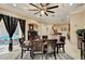 Cozy dining room with access to an outdoor patio and views of the kitchen at 2512 61St E Ave, Ellenton, FL 34222