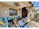 Relaxing outdoor patio with comfortable seating, a ceiling fan, and views of the surrounding area at 2512 61St E Ave, Ellenton, FL 34222