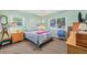 Tranquil bedroom with carpet, natural light, with calm, cozy feel at 2566 Tulip St, Sarasota, FL 34239