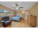 Bedroom features wood floors, natural light, and a comfortable seating area at 2905 Bougainvillea St, Sarasota, FL 34239