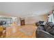 Inviting living room featuring hardwood floors, a ceiling fan, and comfortable seating at 2905 Bougainvillea St, Sarasota, FL 34239