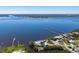 Breathtaking aerial view of the waterfront property with deep water access, multiple docks and serene surroundings at 336 S Orchid Dr, Ellenton, FL 34222