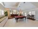 Entertaining game room area with a pool table, built-in bench seating, and a wet bar at 336 S Orchid Dr, Ellenton, FL 34222