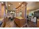 Open concept kitchen with a large center island, breakfast nook, and modern appliances at 336 S Orchid Dr, Ellenton, FL 34222