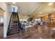 Spacious living area with open floor plan connects to kitchen and dining, perfect for entertaining at 336 S Orchid Dr, Ellenton, FL 34222