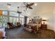 Main bedroom features vaulted ceilings, abundant windows, and cozy sitting area with bay views at 336 S Orchid Dr, Ellenton, FL 34222