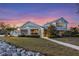 Rear exterior showing the porch, sunroom, and patio with waterfront views at 336 S Orchid Dr, Ellenton, FL 34222