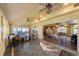 Inviting sunroom with tiled floors, ceiling fans, and plenty of natural light at 336 S Orchid Dr, Ellenton, FL 34222