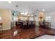 Stylish wet bar area with seating, ample counter space, and multiple TV screens for entertainment at 336 S Orchid Dr, Ellenton, FL 34222