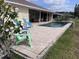 A view of the pool with an outdoor patio and furniture, perfect for entertaining guests at 3419 31St E St, Bradenton, FL 34208