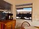 Cozy dining nook with lake view, featuring a breakfast bar and relaxing space to start your mornings at 3419 31St E St, Bradenton, FL 34208