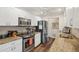 Well-equipped kitchen with stainless steel appliances, granite countertops, and ample cabinet space at 3419 31St E St, Bradenton, FL 34208