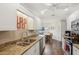 Modern kitchen with stainless appliances, granite counters, and ample cabinet space for easy cooking at 3419 31St E St, Bradenton, FL 34208