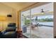 Lanai view shows outdoor living space with lake and pool views at 3419 31St E St, Bradenton, FL 34208