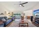 Spacious living room with water view, hardwood floors, and open floor plan at 3419 31St E St, Bradenton, FL 34208