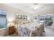 Bright main bedroom featuring a sliding door to the patio and backyard water view at 3419 31St E St, Bradenton, FL 34208