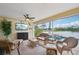 Cozy covered patio with comfortable seating and serene water view at 3419 31St E St, Bradenton, FL 34208
