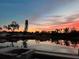 Picturesque pool view with serene water and stunning sunset at 3419 31St E St, Bradenton, FL 34208