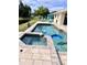 Inviting pool and jacuzzi with colorful floats and outdoor seating at 3419 31St E St, Bradenton, FL 34208