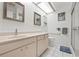Bright bathroom with white vanity, toilet, walk-in shower and neutral accents at 3461 Tallywood Cir # 7067, Sarasota, FL 34237