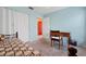 Bedroom with carpeted floors, standard closet, and plenty of light at 3461 Tallywood Cir # 7067, Sarasota, FL 34237