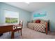 Bedroom with desk area, carpeted floors, bright paint, and plenty of sunlight at 3461 Tallywood Cir # 7067, Sarasota, FL 34237