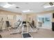 Gym with lots of equipment for your exercise needs, a clean room, and a calming color at 3461 Tallywood Cir # 7067, Sarasota, FL 34237