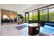 The lanai has tile floors, and windows overlooking the backyard, perfect for relaxation at 3461 Tallywood Cir # 7067, Sarasota, FL 34237