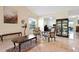 Bright living area with comfortable seating and a view into the office space at 3461 Tallywood Cir # 7067, Sarasota, FL 34237